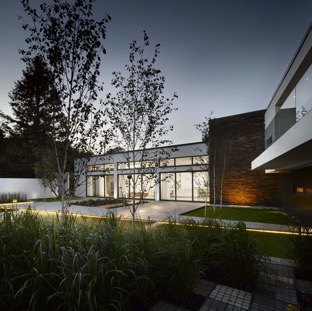 contemporary mansion courtyard evening